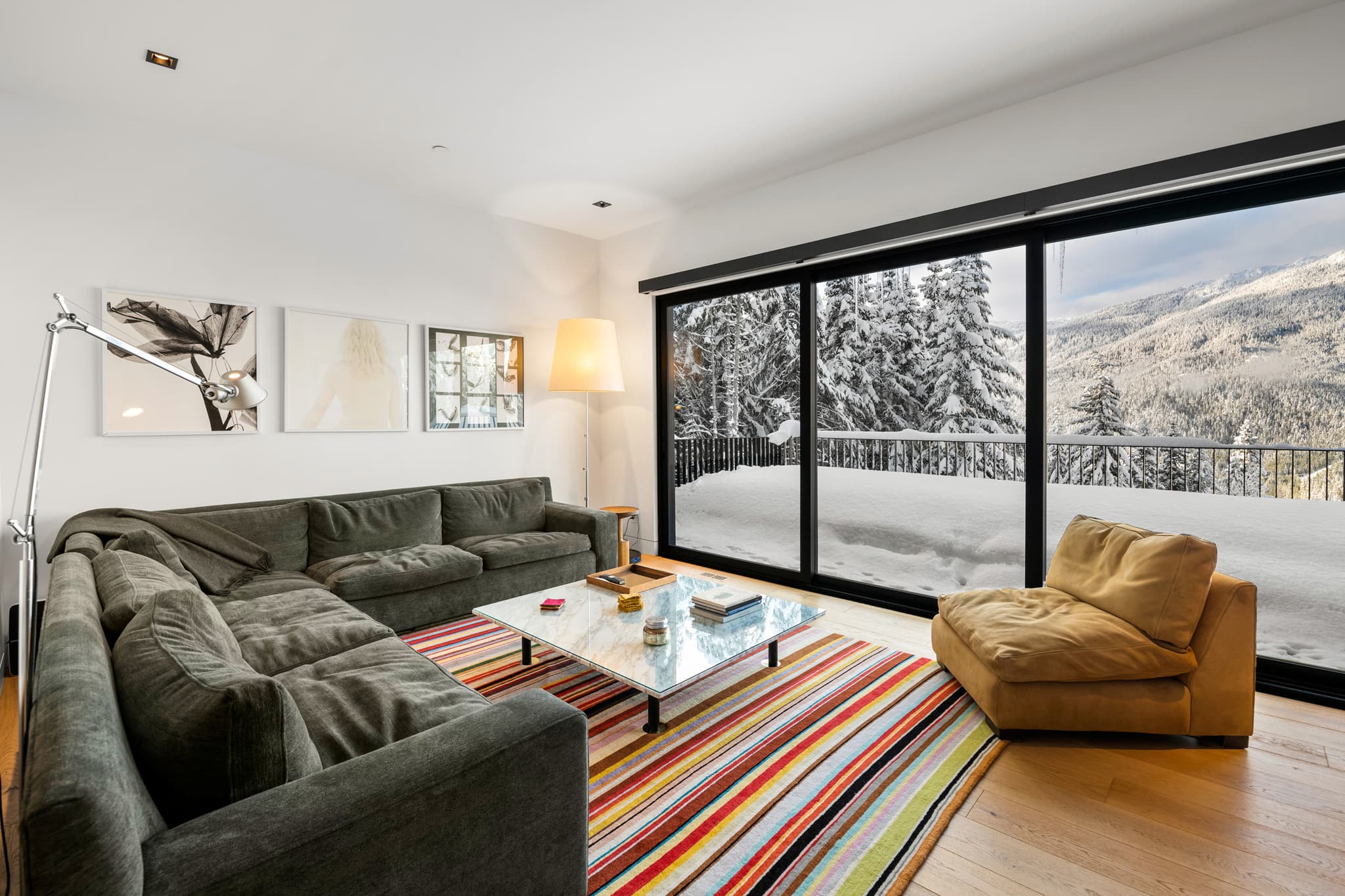 Luxury ski chalet exterior with mountain views