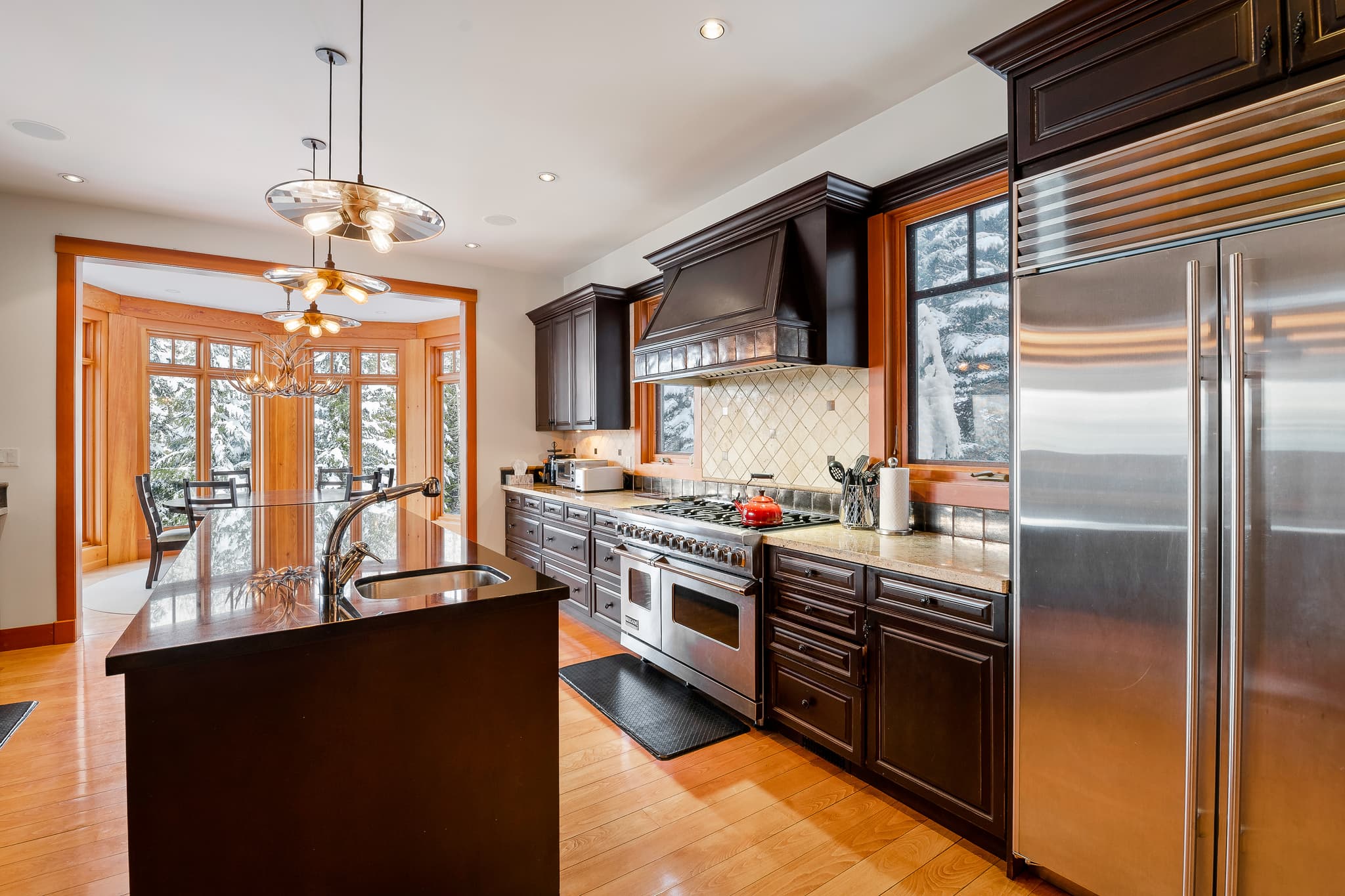 Outdoor dining area with mountain backdrop